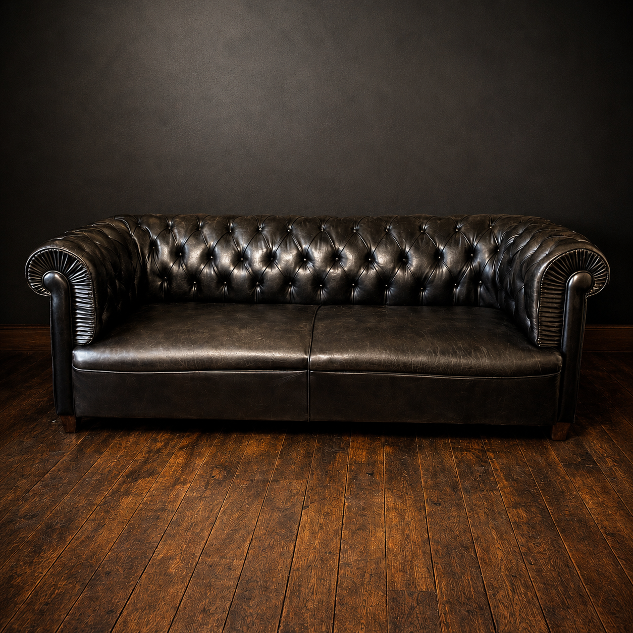 sofa-chesterfield-de-cuero-negro-muelles-the-patina-house